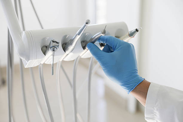Professional Tooth Extraction technician working in Kingston, OK